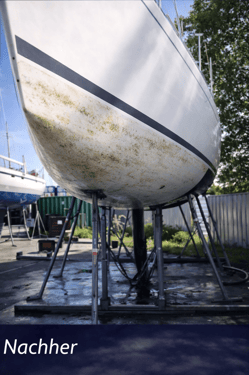 Teilgereinigter Schiffsrumpf nach Entfernung von Biofouling und maritimen Ablagerungen im Trockendock